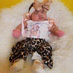 The Sparkling Spur Coco Perfume Bottle Onesie Kids Of A King